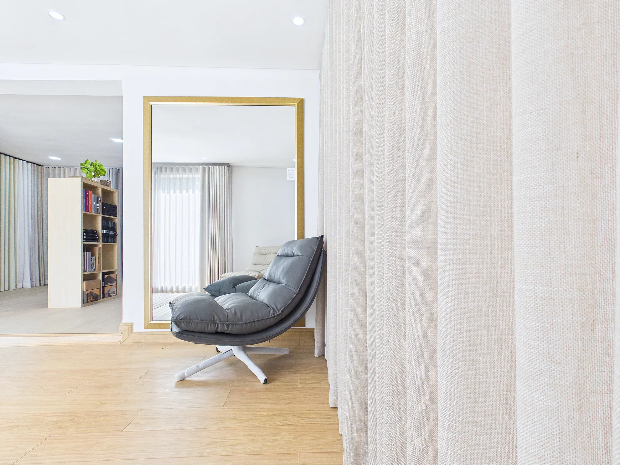 Light wood-look laminate flooring in a bright modern living room
